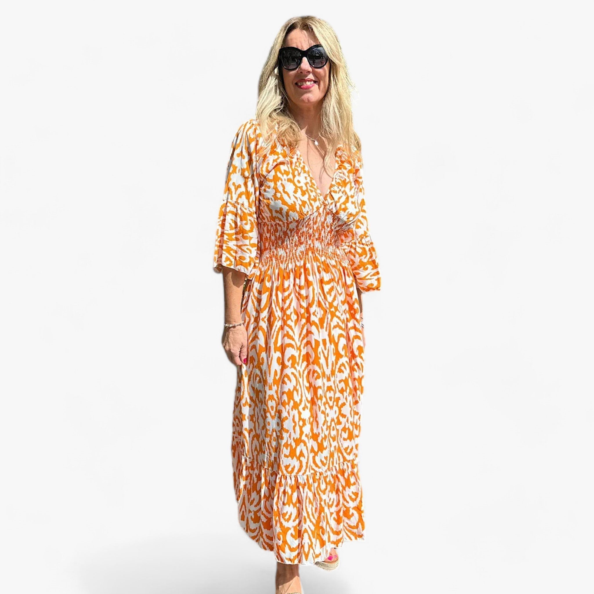 Flora | Beautiful V-neck dress with a large floral print – Perfect for beach vacations
